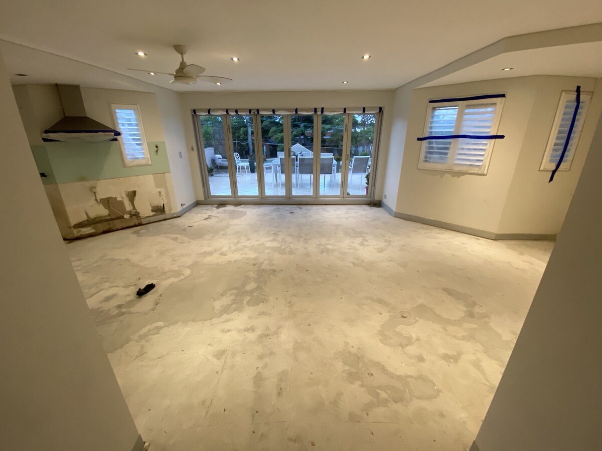 Open-plan area after timber floor removal