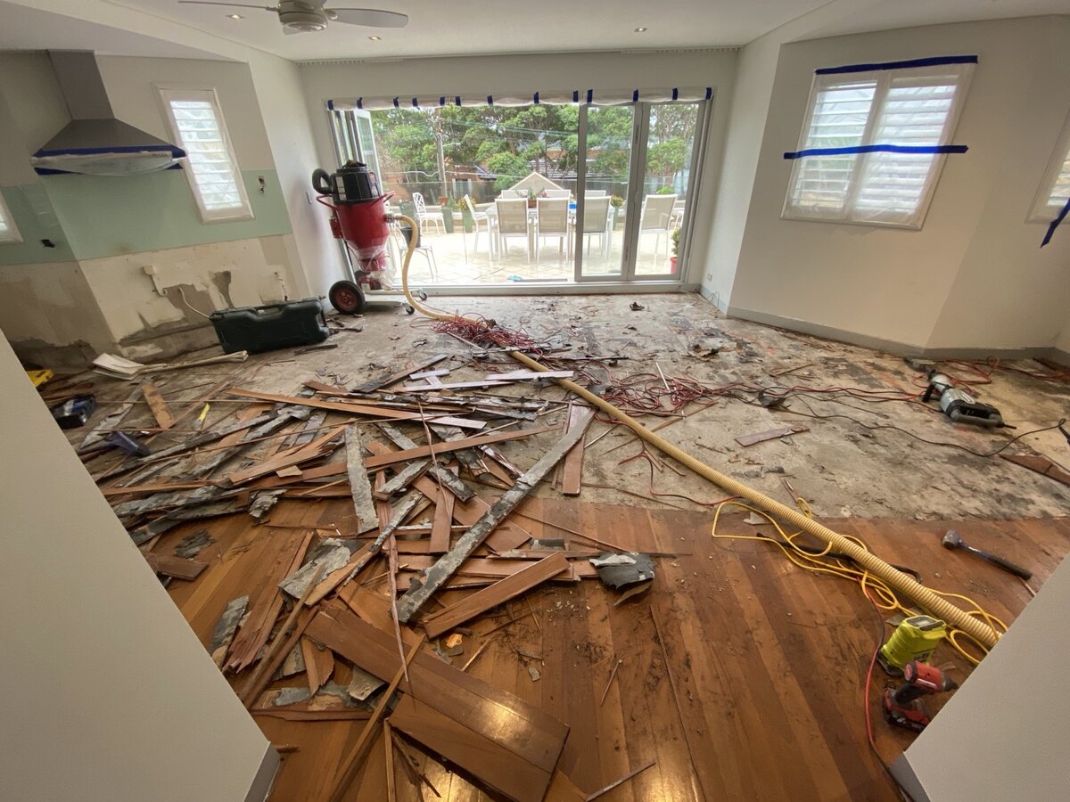 Open-plan timber floor during removal